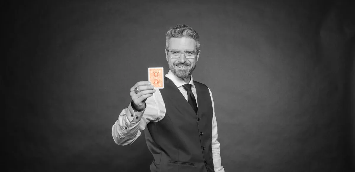 André Desery with a card